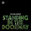 Cover Standing in the Doorway