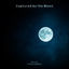 Cover Captured by the Moon